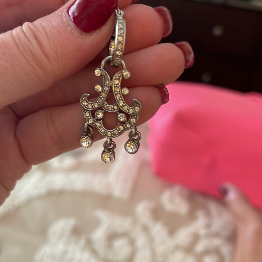 Silver rhinestone chandelier earrings. NEW